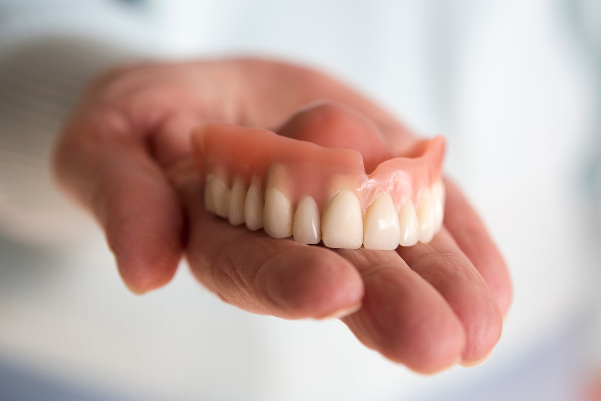 What Is the Difference Between Implant-Supported Dentures and Traditional Dentures?